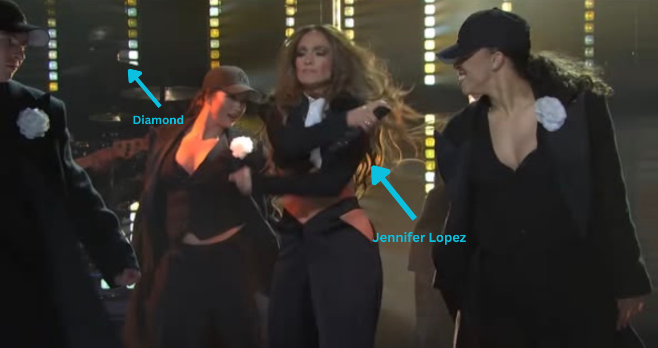Diamond Johnson performing with Jennifer Lopez on SNL